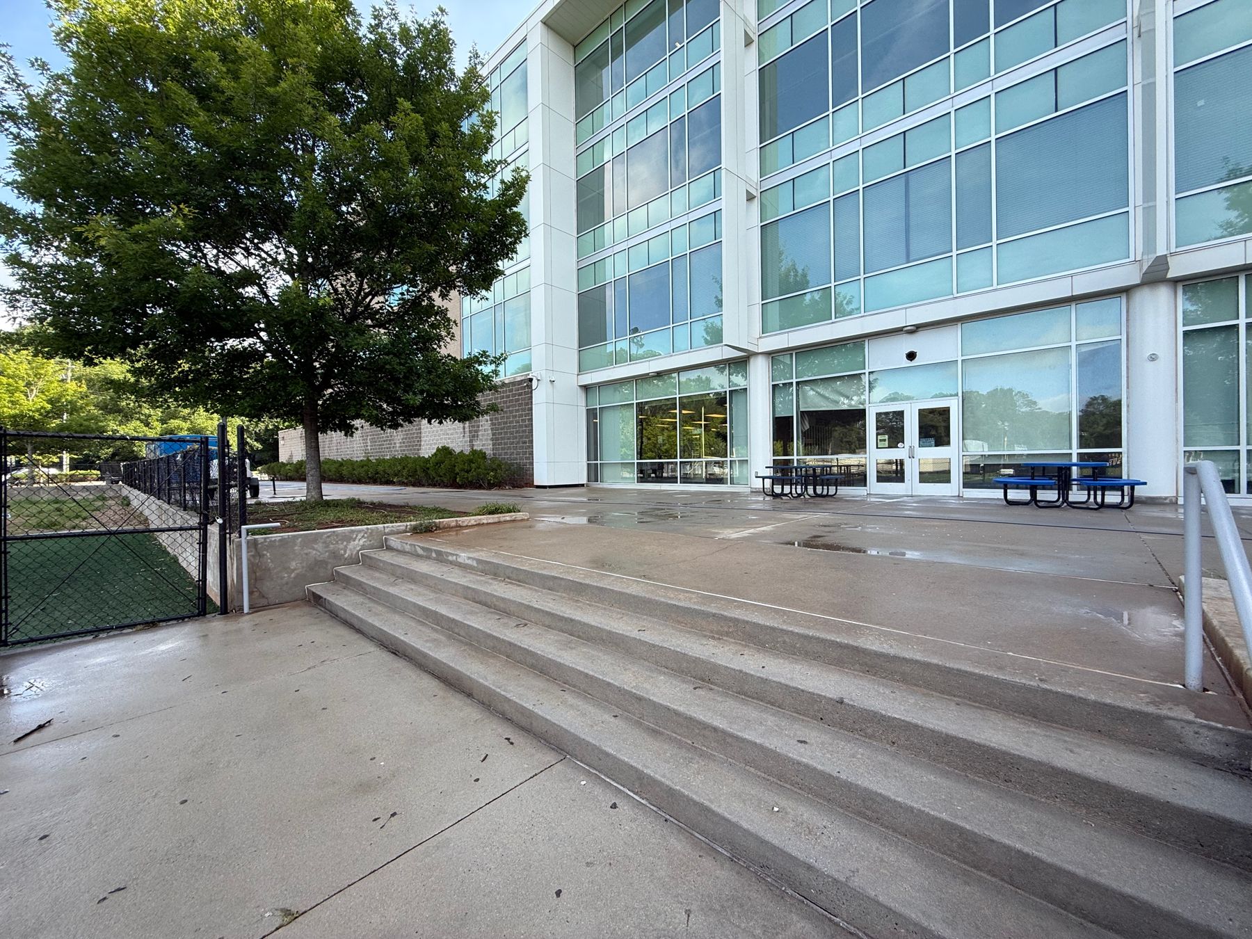 Freshly washed entrance steps at a commercial building