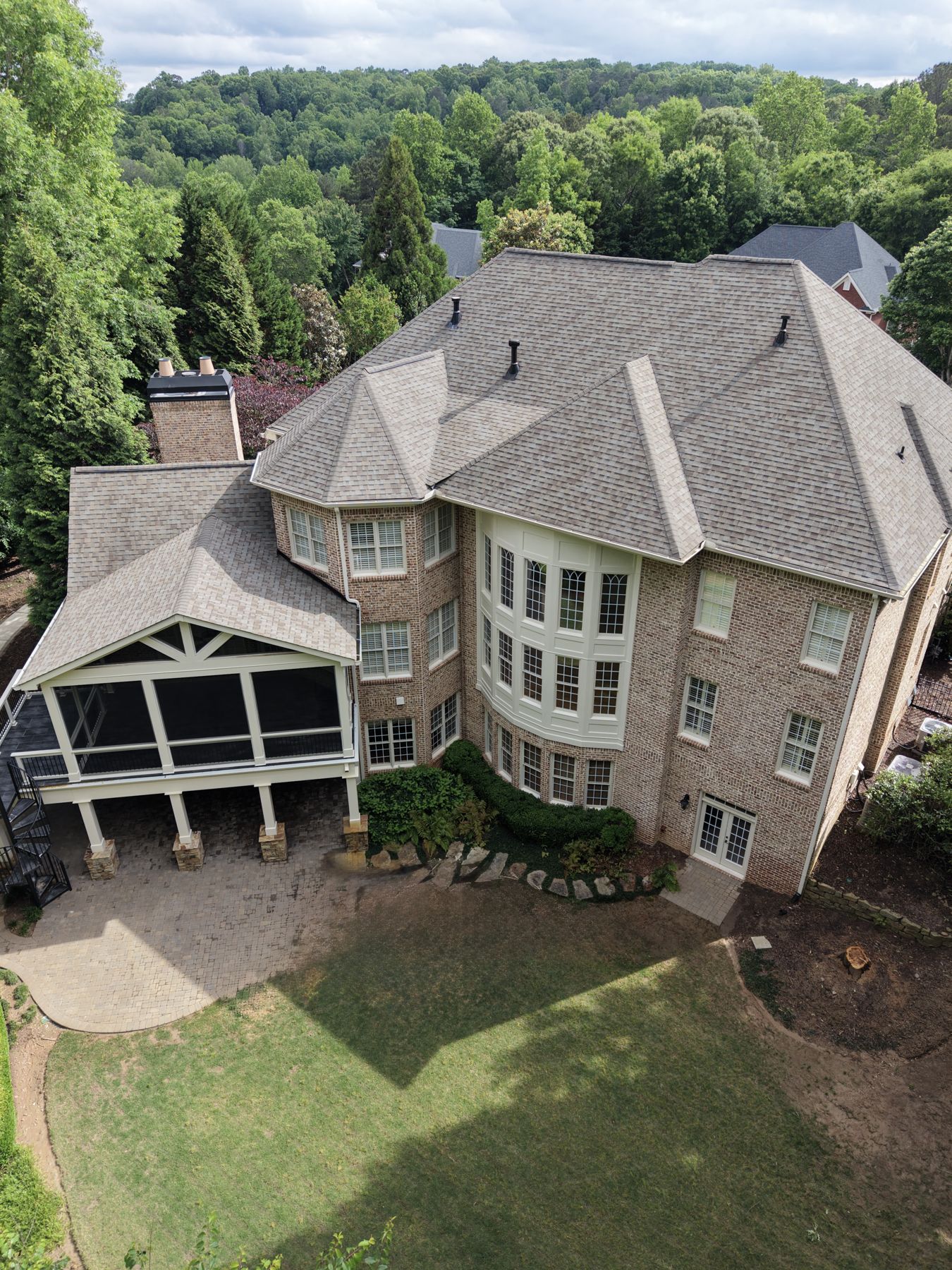 Aerial view of a brick home after house washing